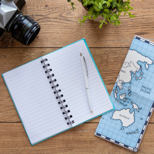 Bitácora de viaje en libreta de bolsillo.